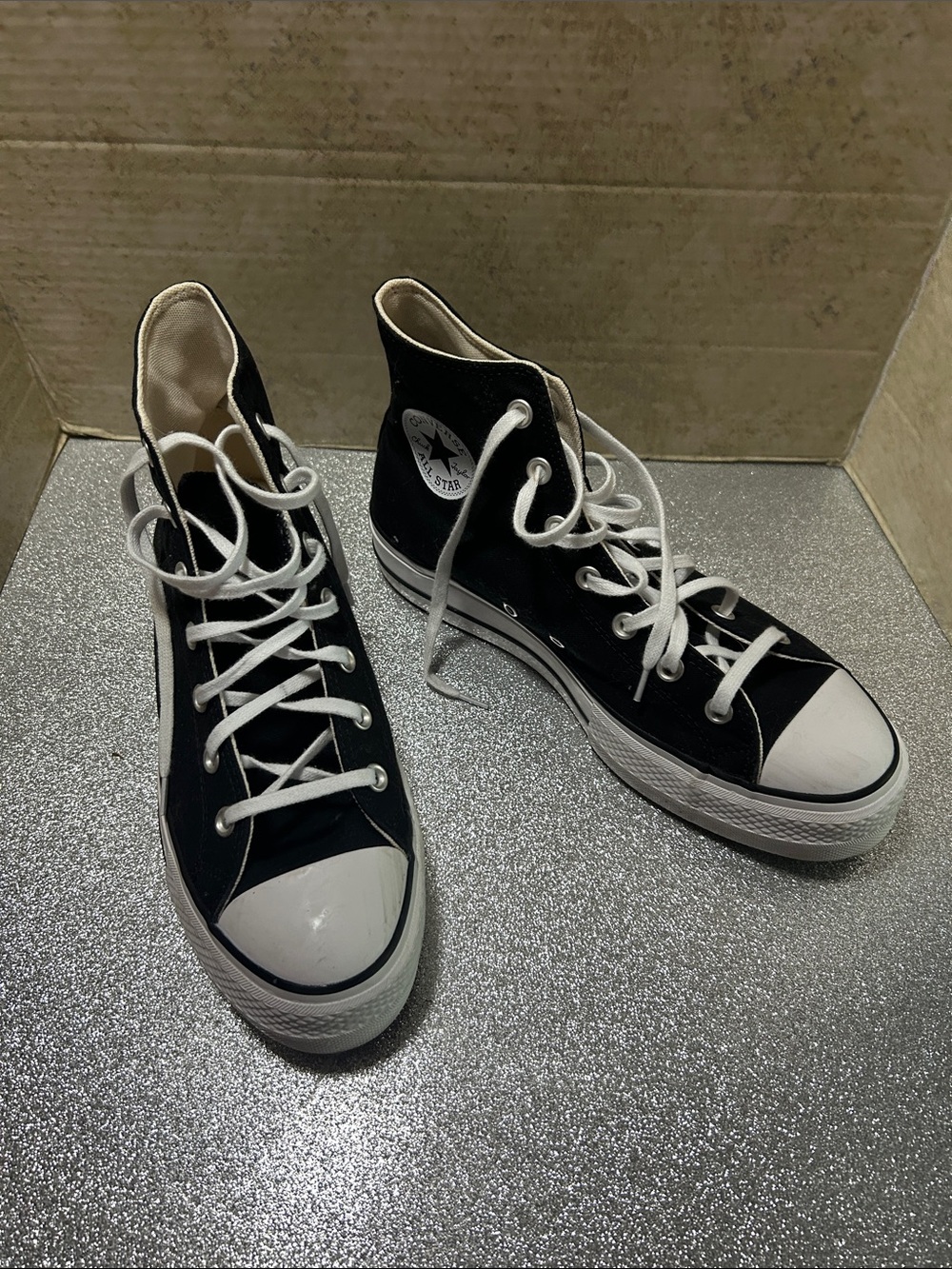 Converse Black and White High Top Chuck Taylor Sneakers
